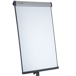 A blank white flip chart with a black frame and a silver top bar, standing on a tripod easel.